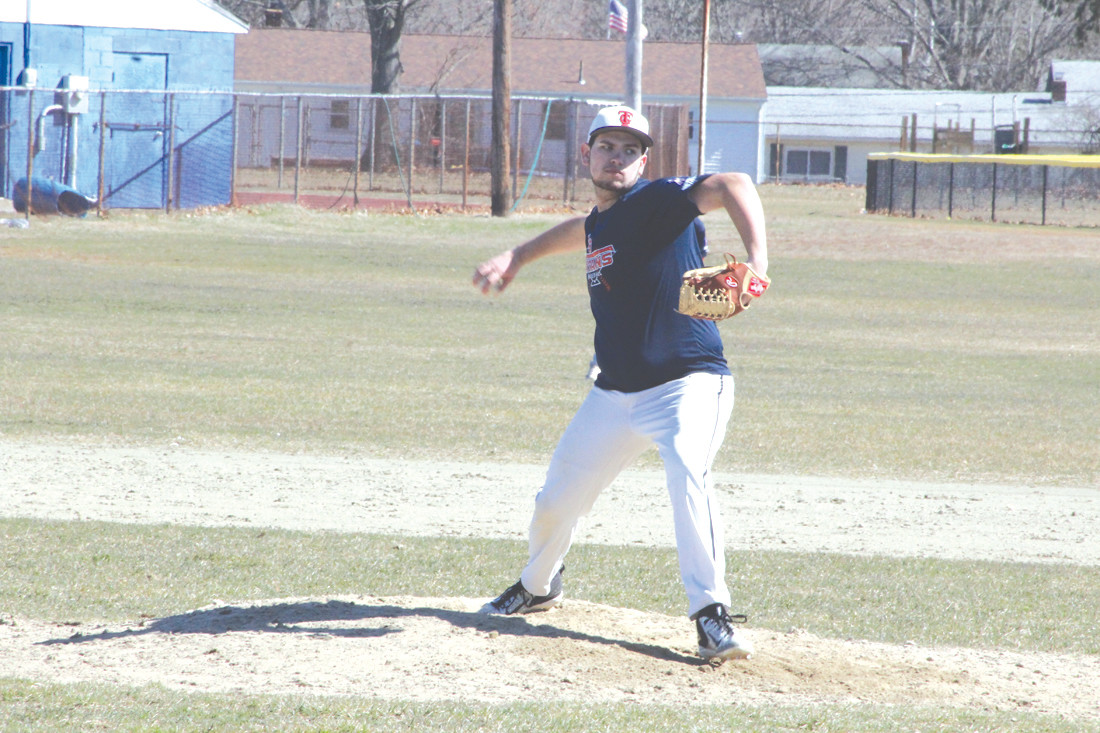 ALL WOUND UP: Ryan Carlson of Toll Gate High School winds up to fire a pitch during Saturday’s practice game against Pilgrim High School.